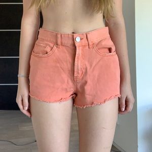 SUPER CUTE UO ORANGE CUT OFF SHORTS